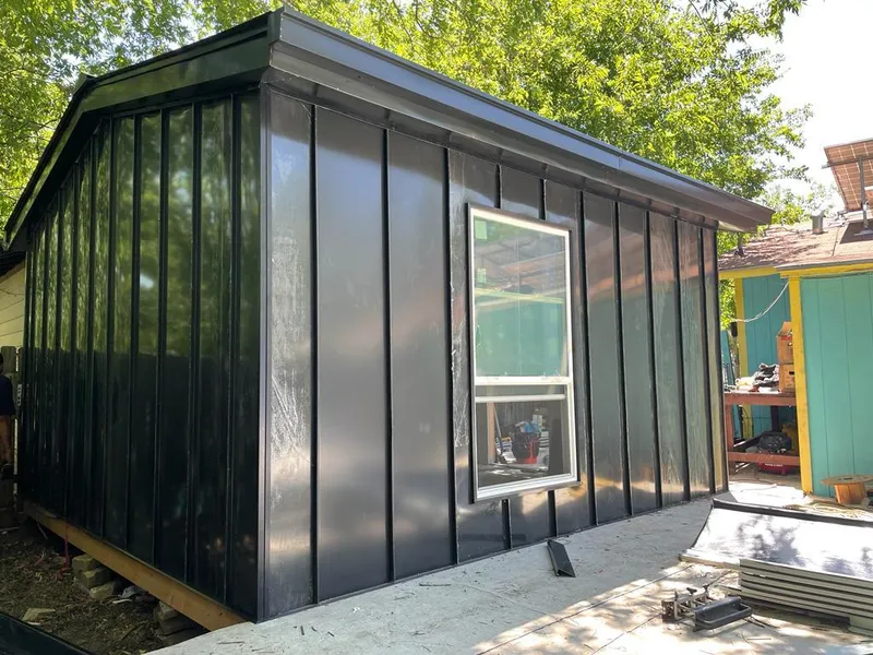 Black standing seam metal wall panels for Metal Roof Installation in Middle Valley