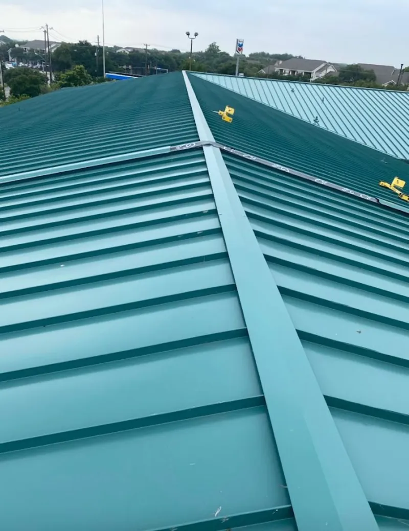 Green commercial metal roof ridge and valley for Metal Roof Repair in Middle Valley