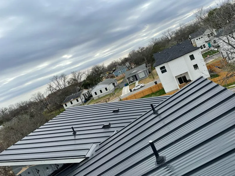 Standing seam metal roof panels with vents for Skylight Repair in Middle Valley
